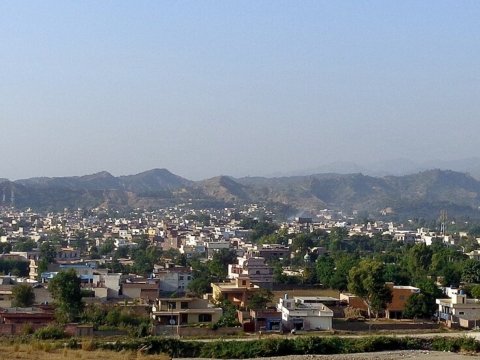 Panoramic view of the town of Bhimber at the foot of the hills
